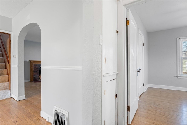 hallway featuring light hardwood / wood-style flooring