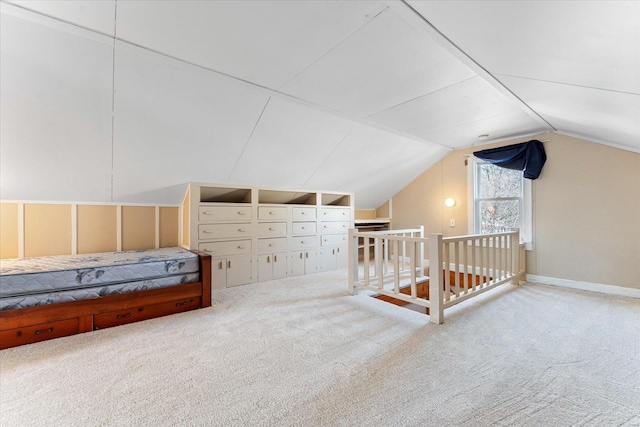 bonus room featuring carpet flooring and vaulted ceiling