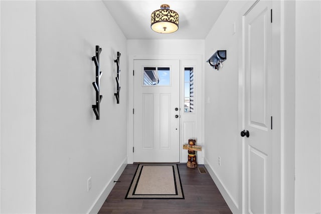 doorway to outside featuring dark hardwood / wood-style flooring