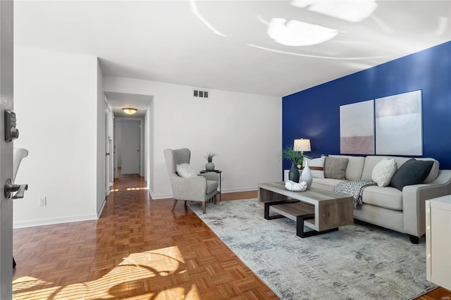 living room with parquet flooring