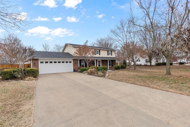 view of front facade with a garage and a front lawn