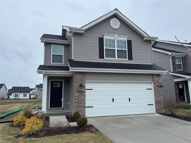 view of front of property with a garage