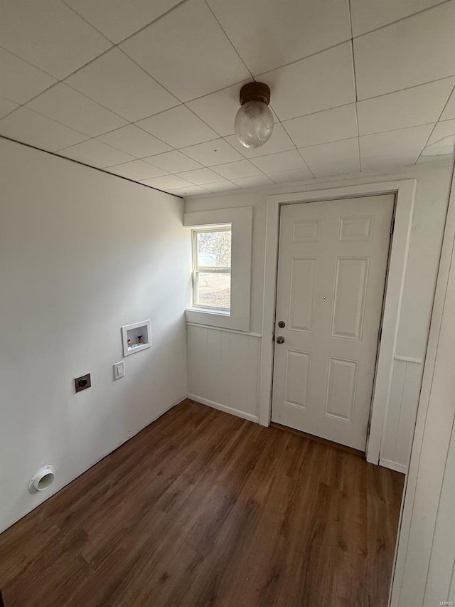 washroom featuring dark hardwood / wood-style floors and hookup for a washing machine