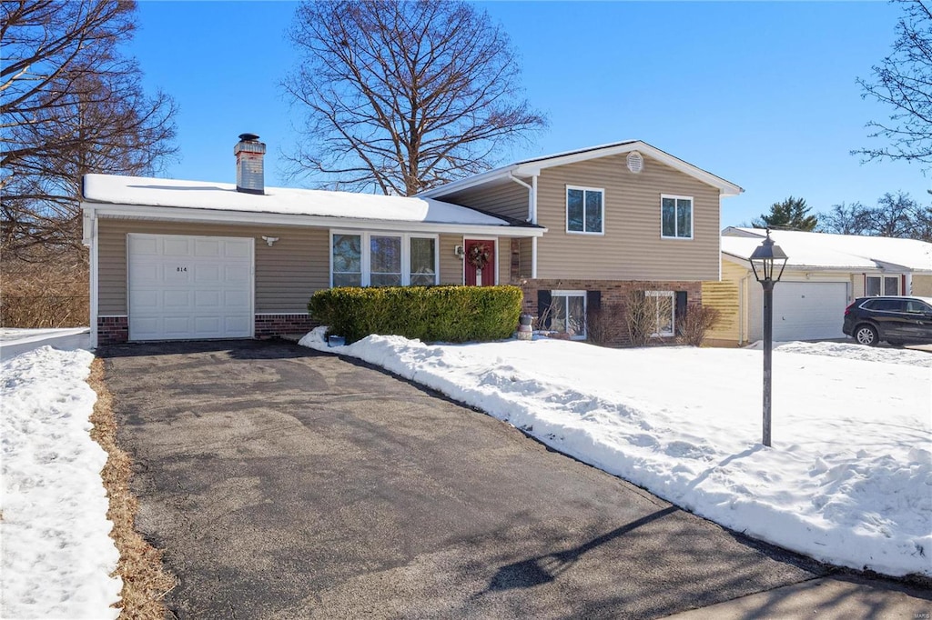 tri-level home featuring a garage