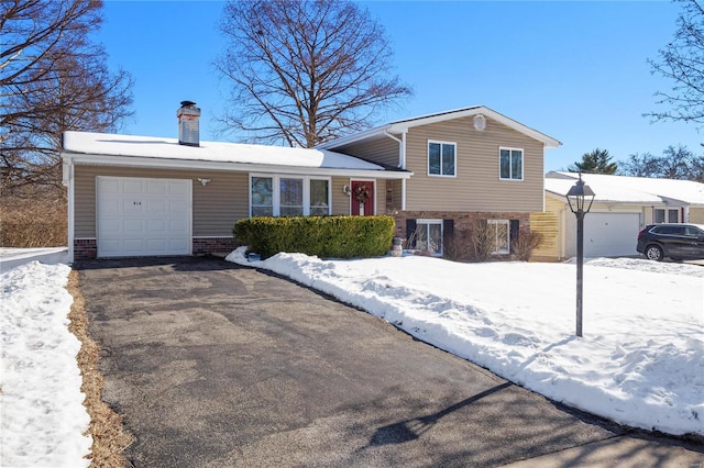 tri-level home featuring a garage