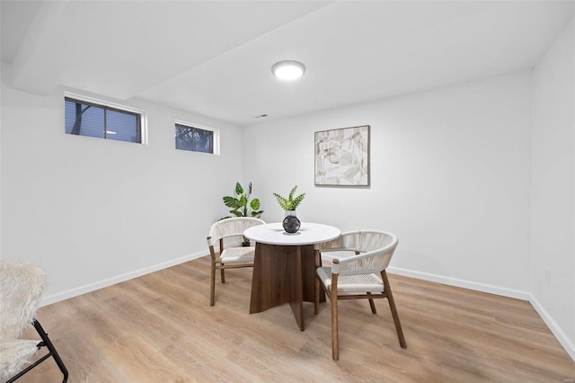 dining space featuring light hardwood / wood-style flooring