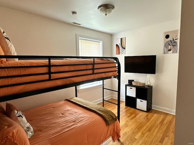 bedroom featuring light wood-type flooring