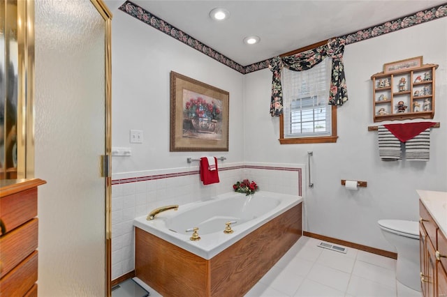 full bathroom featuring toilet, vanity, tile patterned floors, and plus walk in shower