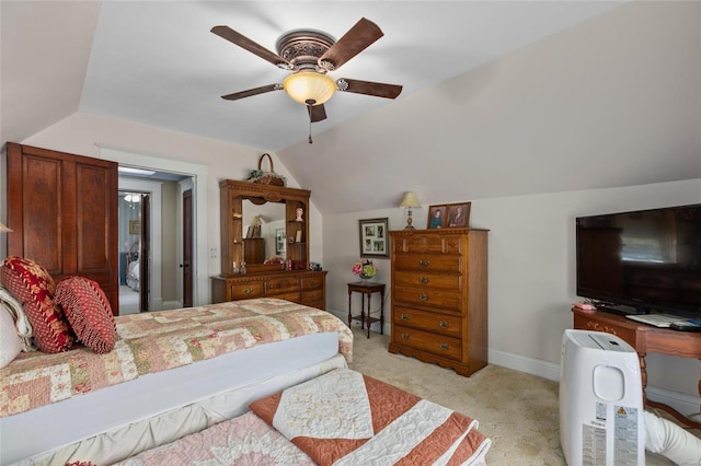 bedroom with ceiling fan, lofted ceiling, and light carpet