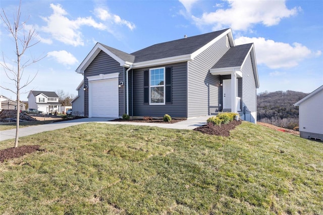 ranch-style home featuring a front lawn and a garage