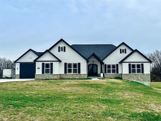 modern farmhouse with a front yard and a garage