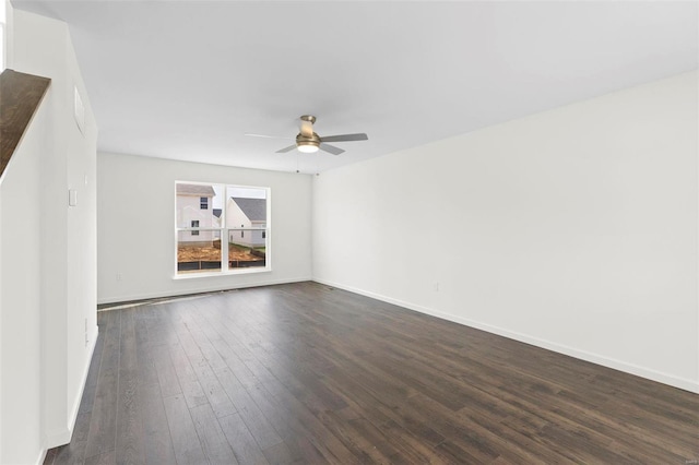 unfurnished room featuring dark hardwood / wood-style floors and ceiling fan