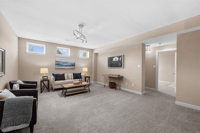 living room with baseboards and carpet floors