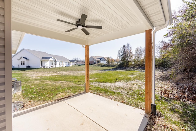 view of patio featuring ceiling fan