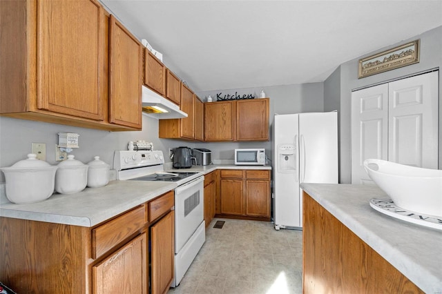 kitchen featuring white appliances