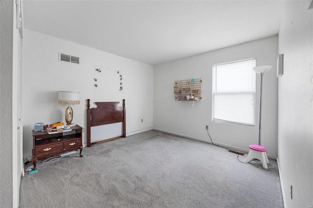 interior space featuring light colored carpet