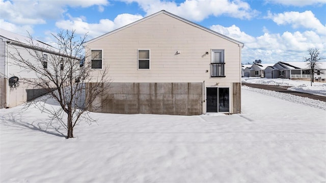 view of snow covered property