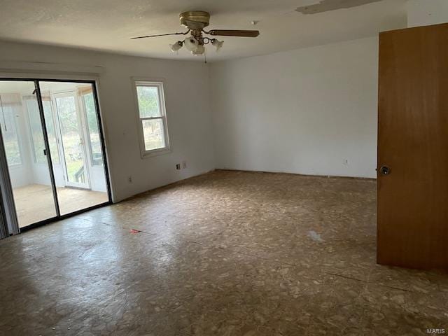 spare room featuring ceiling fan