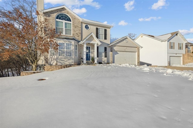 view of front of property featuring a garage