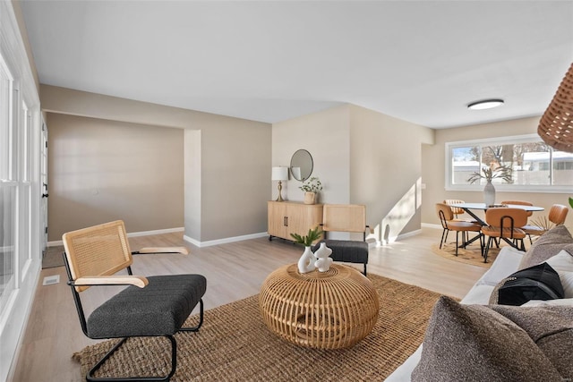 sitting room with light hardwood / wood-style floors