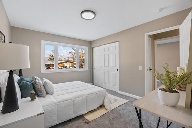 carpeted bedroom featuring a closet