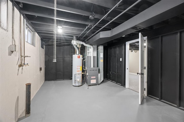 basement with heating unit and water heater