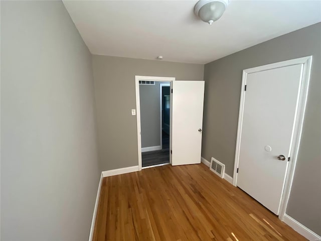 unfurnished bedroom with light hardwood / wood-style floors