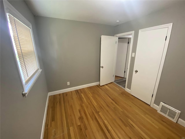 unfurnished bedroom with light hardwood / wood-style floors