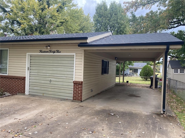 garage with a carport