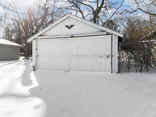 view of snow covered garage