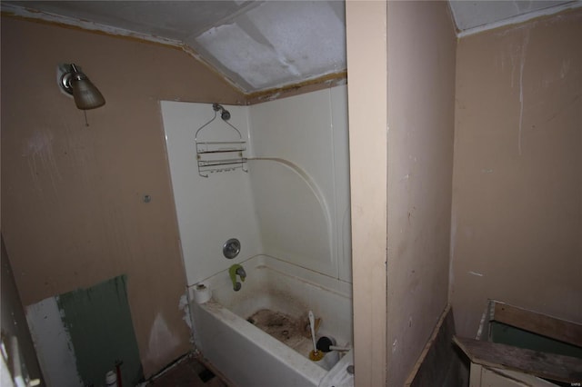 bathroom with  shower combination and vaulted ceiling