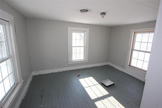 empty room featuring dark hardwood / wood-style floors