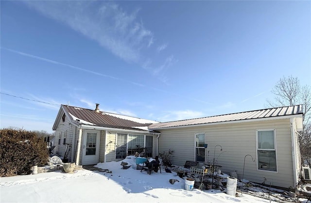 view of snow covered property