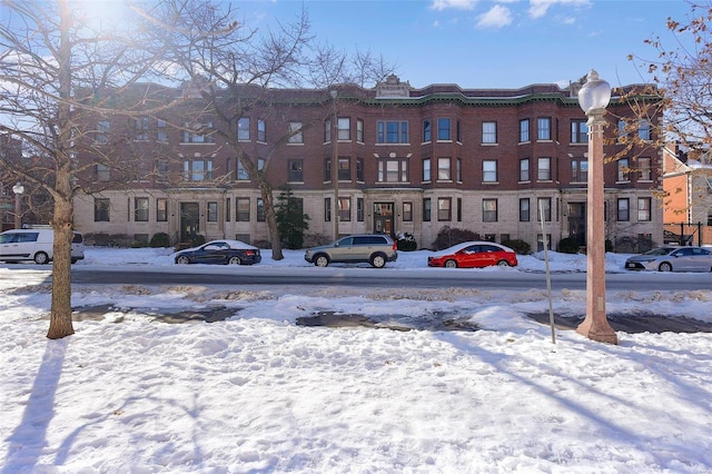 view of snow covered property