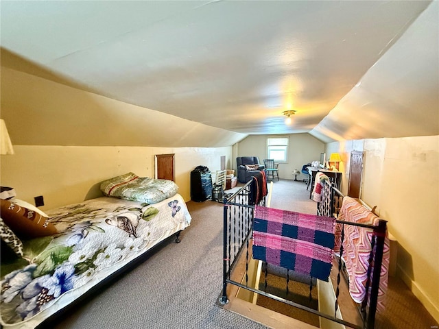 carpeted bedroom featuring vaulted ceiling