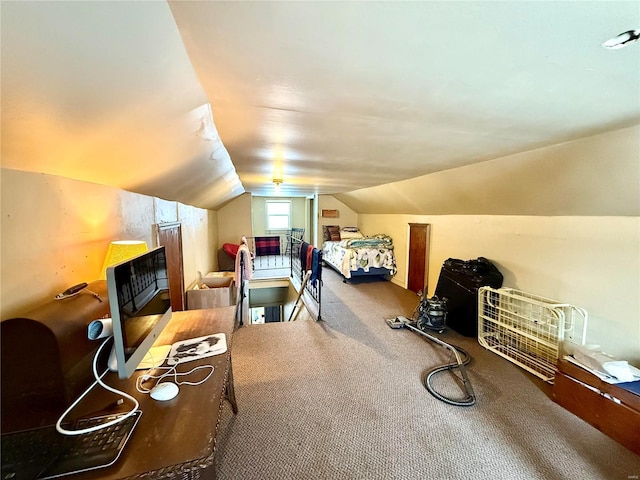 carpeted bedroom with vaulted ceiling