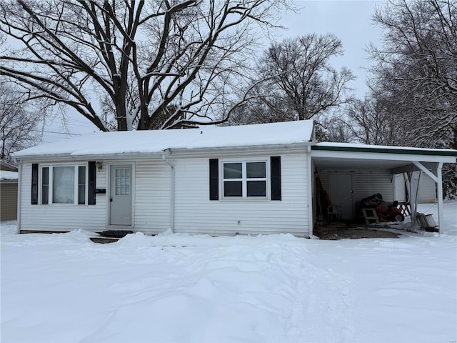 view of front of house featuring a carport