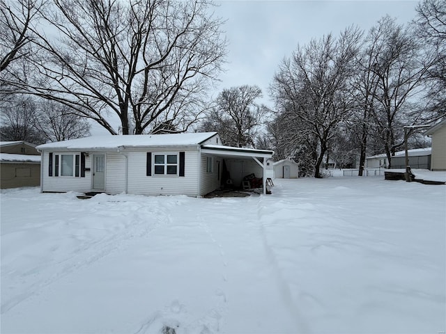 exterior space with a carport