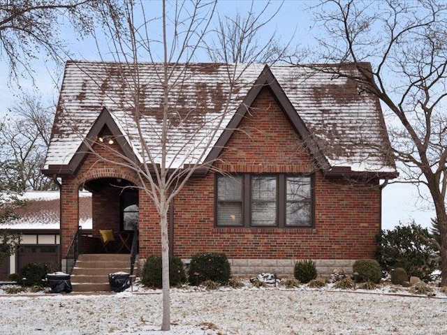 tudor house with brick siding