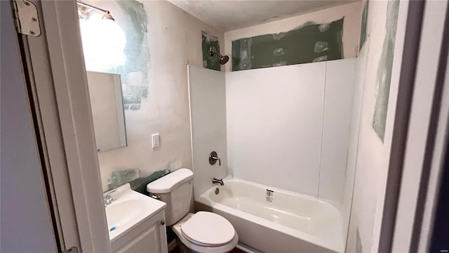 full bathroom featuring vanity, toilet, and bathing tub / shower combination