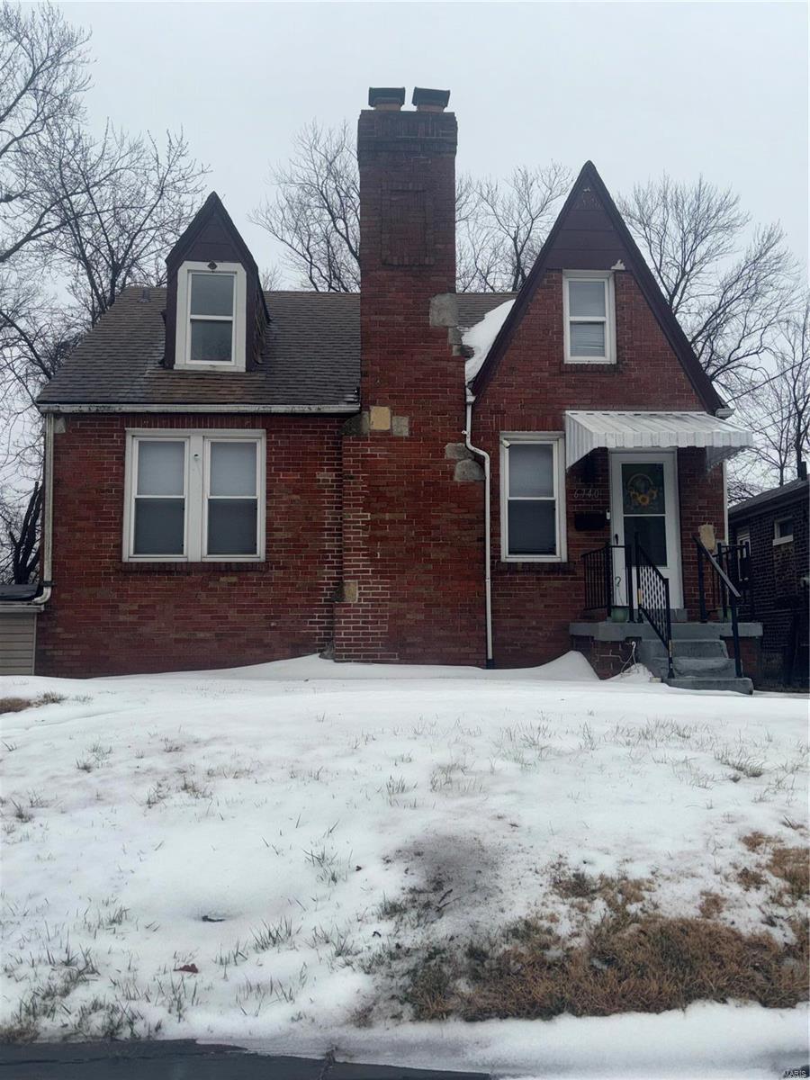 view of snow covered property