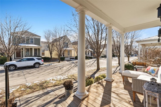 wooden terrace featuring a porch