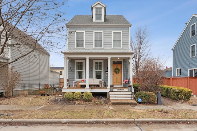 view of front of property featuring covered porch