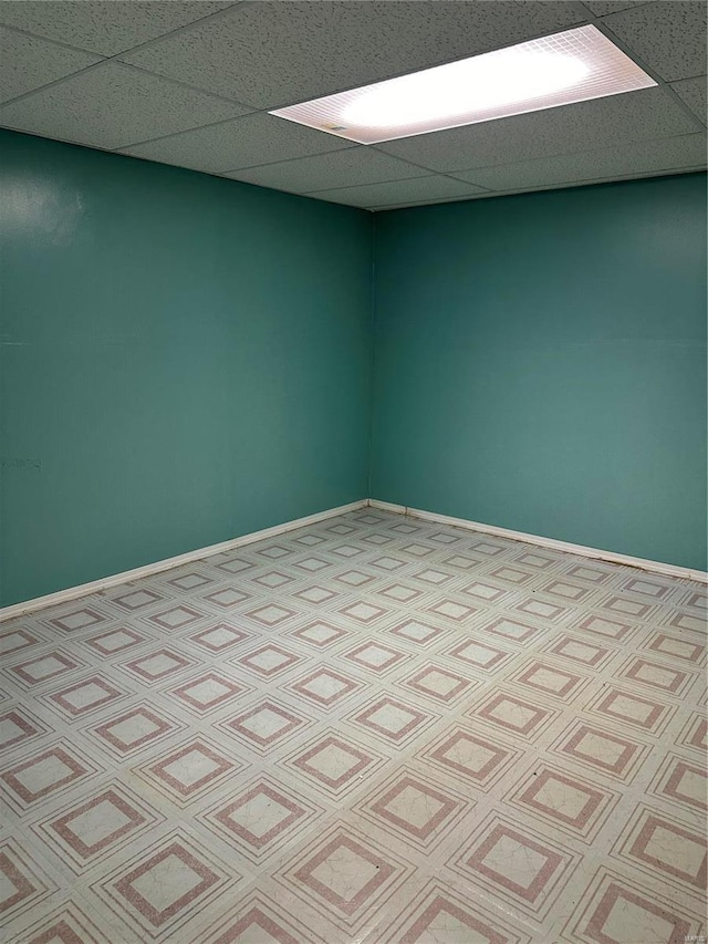 empty room with a drop ceiling