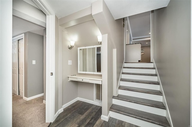 stairway featuring hardwood / wood-style flooring