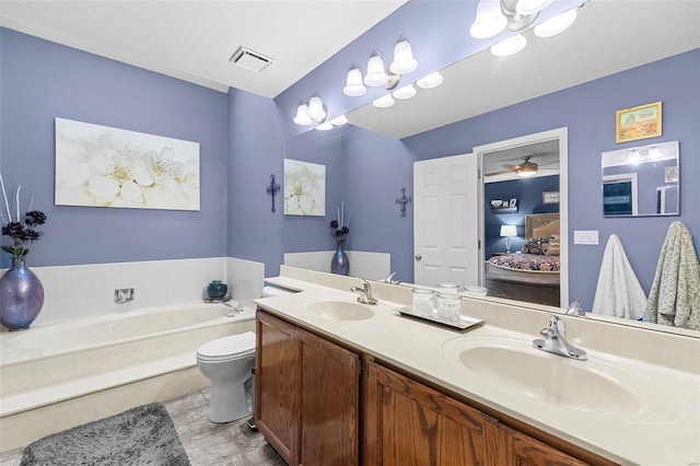 bathroom featuring visible vents, a garden tub, a sink, ensuite bath, and double vanity