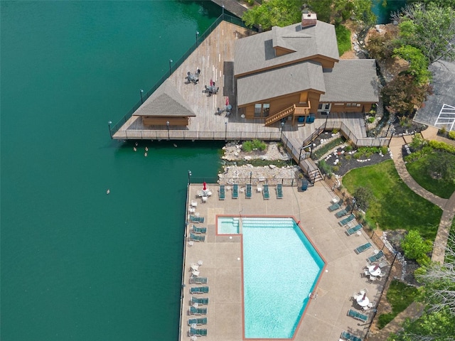 birds eye view of property featuring a water view