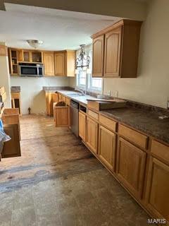 kitchen featuring sink and appliances with stainless steel finishes