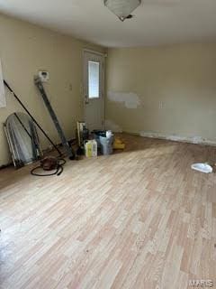 spare room with light hardwood / wood-style floors