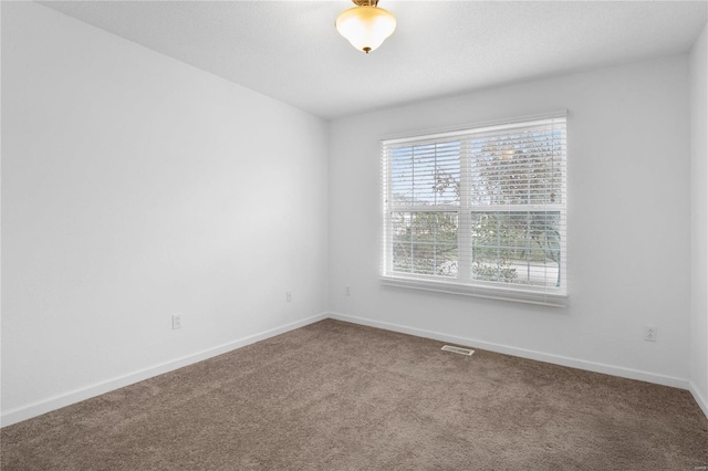 empty room with carpet floors